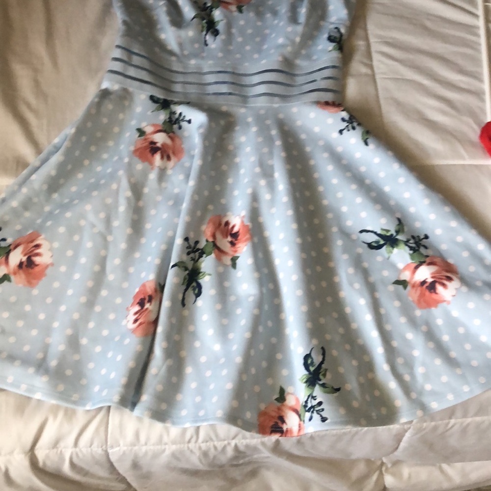 Light blue dress with white dots and pink flowers